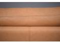 Skalma sofa upholstered in all leather in a caramel colour.