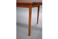 Midcentury teak dining table with hidden draw leaves  - view 4