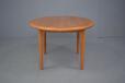 Danish design dining table with fold out central leaf