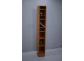 Hundevad narrow bookcase in teak with 7 shelves. SOLD.