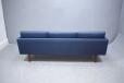 The sofa bed is upholstered in blue fabric which is ready to be replaced.