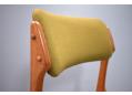 Teak framed green fabric chair designed by Erik Buch.