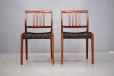 1965 design dining-chairs with rosewood frames & black colour fabric seats.