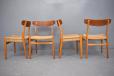 Midcentury model CH23 dining chairs in beech with papercord seat produced by Carl Hansen