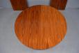 Vintage circular dining table extending with 2 extra leaves in rosewood produced by Rosengaarden, Denmark