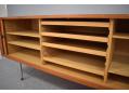 The sideboard features adjustable shelving system.
