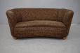 Classic danish kidney shaped sofa sold as reupholstery project