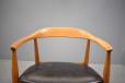 Danish design curved back armchair in solid ash with leather upholstered seat designed 1959 by Arne Wahl Iversen for Eilersen