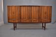 Large vintage rosewood sideboard with sliding doors and adjustable shelving produced by Sejling Skabe