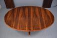  Vintage oval dining table in rosewood designed by John Mortensen with pedestal legs