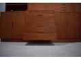Teak wall unit made in Denmark with modular cabinets.