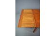 Midcentury henry Kjaernulf design teak dining table with 2 pull out leaves made in denmark