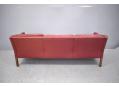 Midcentury design 3 seat sofa with low back box frame.