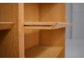 Solid block wood constructed shelves won't sag under the weight of books.