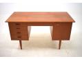 Teak desk made in Denmark with lots of deep storage options.