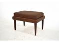 Danish design footstool in brown leather upholstery with rosewood legs. SOLD