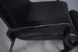 Black frame Danish design high back armchair and matcning footstool
