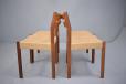 Set of four teak dining chairs with new woven papercord seats 
