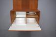 The drinks cabinet is lined with white formica which is water proof