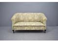 1940s design 2 seat sprung sofa with floral pattern fabric.