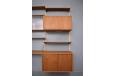 Wall mounted storage / display system designed in 1953 by Prebend sorensen in vintage teak
