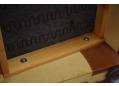 Dismantlable Skalma armchair with high back & light brown leather upholstery.