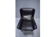 Vintage black leather wingback armchair on rosewood legs designed 1951 by Illum Wikkelso