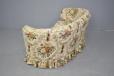 Vintage Danish design curved sofa in floral upholstery