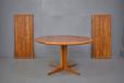 Extending teak dining table with pedestal legs produced by Danish Mobelfabrik