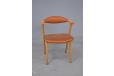 Model 49B carver chair with brown leather upholstery and oak frame