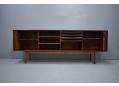 Large open compartment with adjustable shelves & shallow drawers.