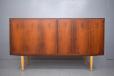 Compact rosewood sideboard with locking doors by Carlo Jensen
