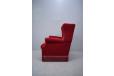 Red velour high back armchair with reversable sprung cushion made by Danish Cabinetmaker