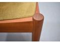 Bramin single teak frame dining chair with yellow green fabric upholstery.