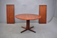 Vintage pedistal leg dining table in vintage rosewood with 2 extra leaves