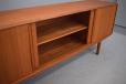 Sliding door teak sideboard with drawers designed by E W Bach
