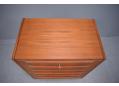 Teak chest of 6 drawers with lipped handles.