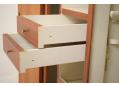 Middle narrow section with shelved storage for smalls.