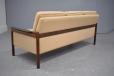 Dark finish wood framed 3 seat sofa made in Denmark. 