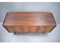 Stunning short sideboard in Honduran rosewood with raised edges.