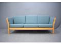 Modern Danish design 3 seat sofa in light blue fabric with beech frame ends. SOLD
