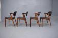 Elegant dining chairs in vintage rosewood and black leather - Timeless