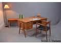 A stylish and rare teak desk with lots of work space and storage. Svend A Madsen design.