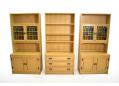 Pair of matching coloured glass door wall units in oak.