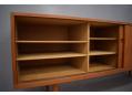 All internal shelves are adjustable or removable on this Wegner sideboard