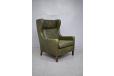 Classic wingback armchair in original green leather - view 2