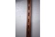 Aluminium wall rail with rosewood veneer is easy to fit on the wall with screws