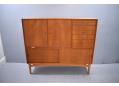 1950s Danish highboard in teak raised on oak legs