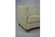 Standing firmly on short dark finish legs in solid beech