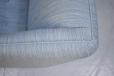 Pale two-tone blue upholstery is URD plain from Danish art weaving. 